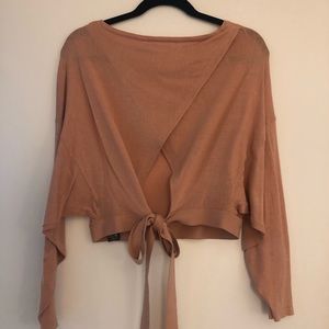 Cropped sweater with tie back detail